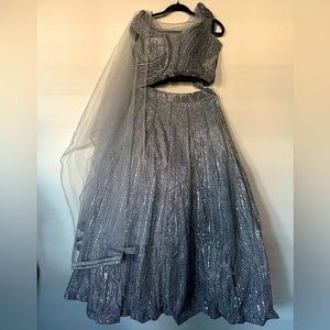 Indian traditional lehengra. Very glittery and bright irl.